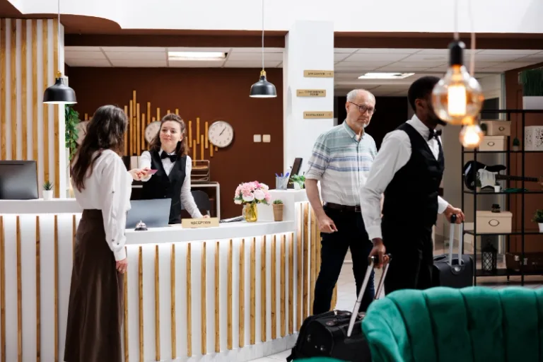 Guests at a hotel reception desk